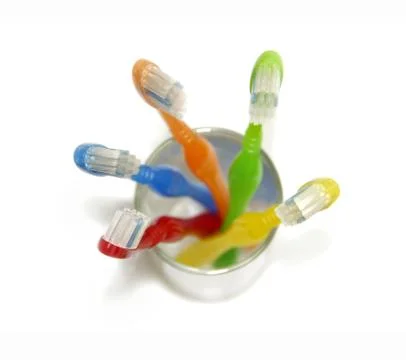 Toothbrushes in grass Stock Photos
