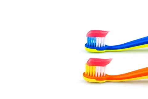 Toothbrushes with toothpaste Stock Photos