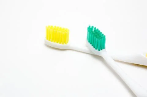 Toothbrushes on white background Stock Photos