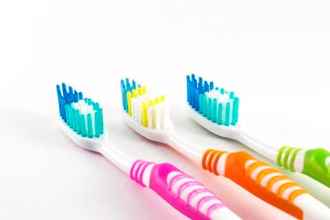 Toothbrushes On White Background Stock Photos