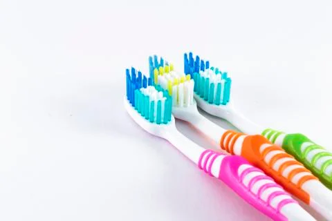 Toothbrushes on white background Stock Photos
