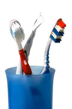 Toothbrushes on white zone Stock Photos