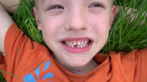 Toothless boy Stock Footage 154374119