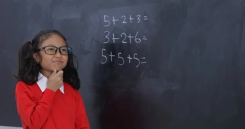Toothless student solving a math problem Stock Footage 86991362