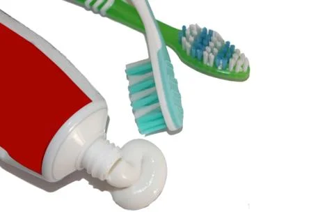 Toothpaste and brush Stock Photos