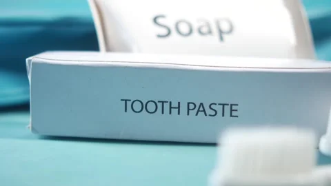 Toothpaste and soap in a hotel or travel kit Stock Footage 297938431