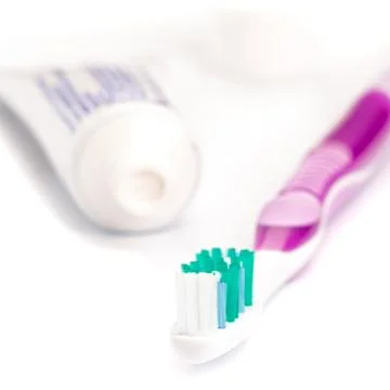 Toothpaste and toothbrush Stock Photos