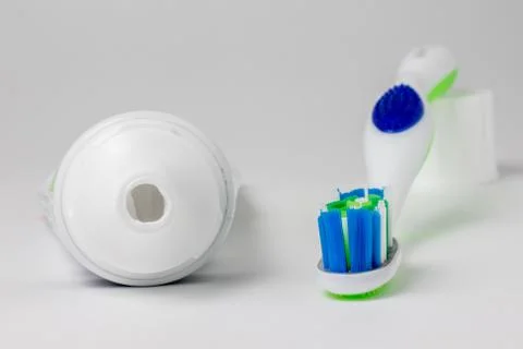 Toothpaste and toothbrush on a white background Stock Photos