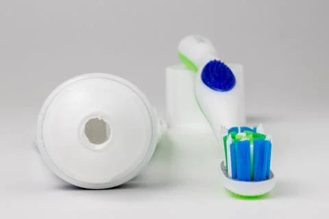 Toothpaste and toothbrush on a white background Stock Photos