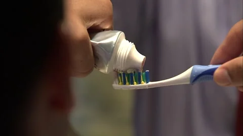 TOOTHPASTE ON BRUSH Stock Footage 5391662