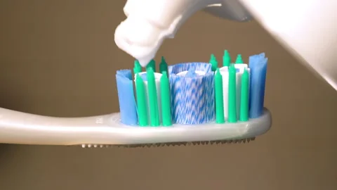 Toothpaste On Toothbrush Close Up. Stock Footage 139942045