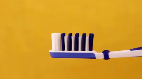 Toothpaste on the toothbrush closeup Stock Footage 47282366