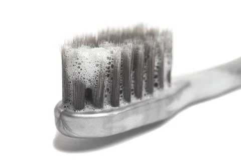 Toothpaste on toothbrush isolated on white background 스톡 사진