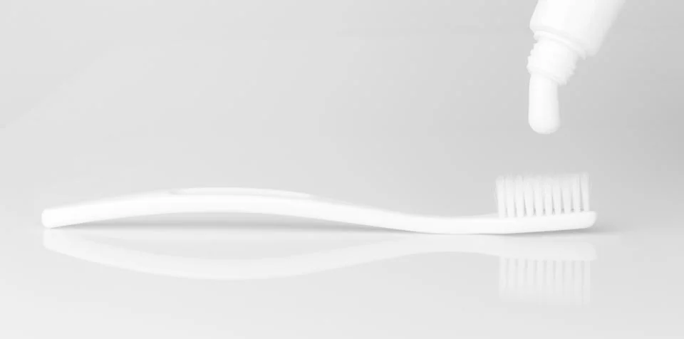 Toothpaste toothbrush isolated on white background Stock Photos
