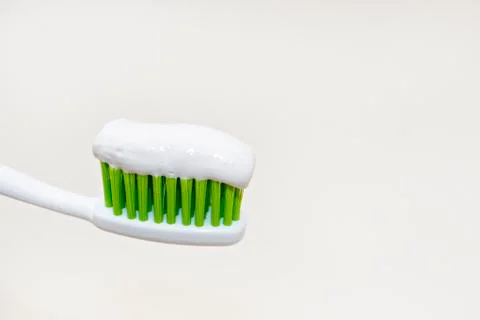 Toothpaste on toothbrush Stock-Fotos