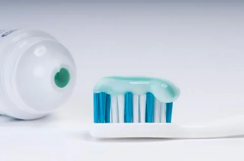   Toothpaste on the toothbrush Stock Photos