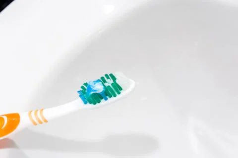 Toothpaste on Toothbrush Stock Photos