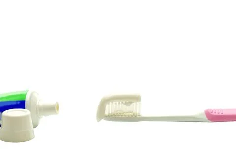 Toothpaste on the toothbrush Stock Photos