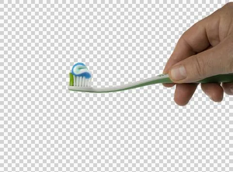 Toothpaste on the toothbrush on a transparent background Stock Photos