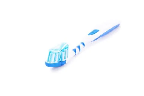 Toothpate on a toothbrush Stock Photos