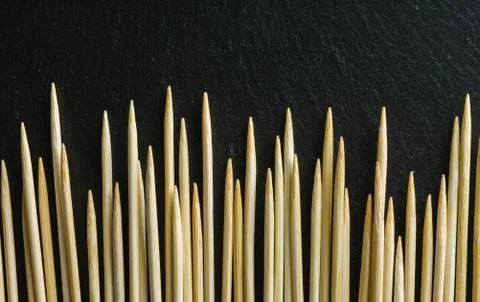 Toothpick on a black background. Not an even number Stock Photos