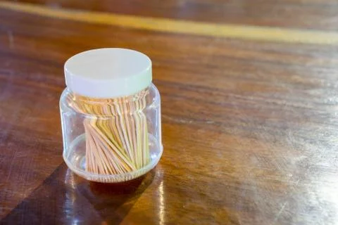Toothpick in a bottle on table Stock Photos