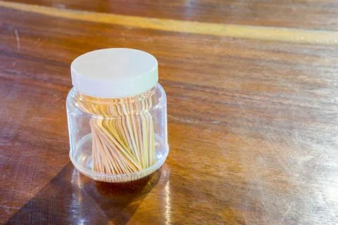 Toothpick in a bottle on table Stock Photos