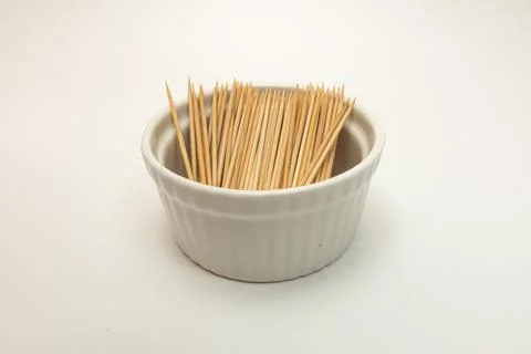 Toothpick in a container on a white background Stock Photos