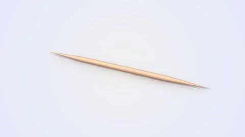 Toothpick on a Light Reflective Floor. Toothpick 3D Animation. 4K Stock Footage 300436368