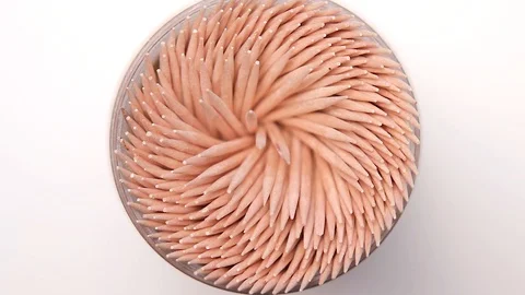 Toothpick on white background rotation. Concept of teeth hygiene or oral too Stock Footage 127573599