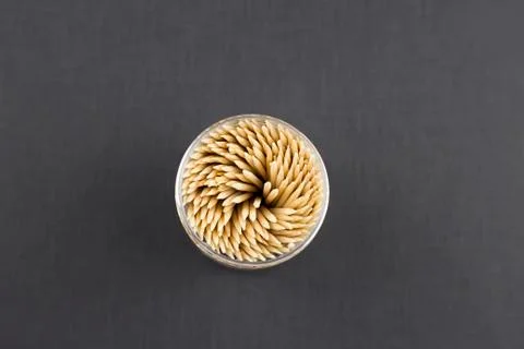 Toothpicks on a black background Photos