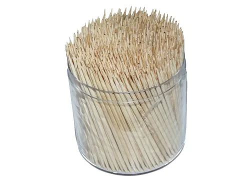 Toothpicks in a box isolated on white background Photos