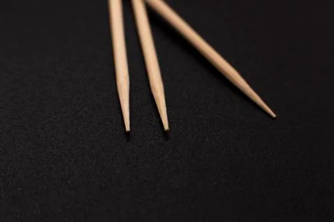 Toothpicks on a dark background. close up Fotos de archivo