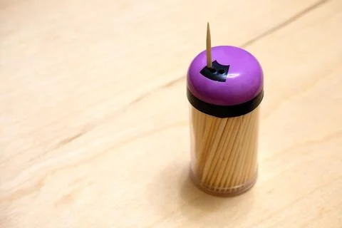 Toothpicks in a jar standing on the table Stock Photos