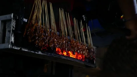Top 45 degree view of Sate or satay, traditional food from Indonesia is bei.. Stock Footage 294276067