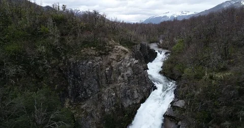Top aerial close up of stream discovering the power of water while falling 스톡 동영상 126253469