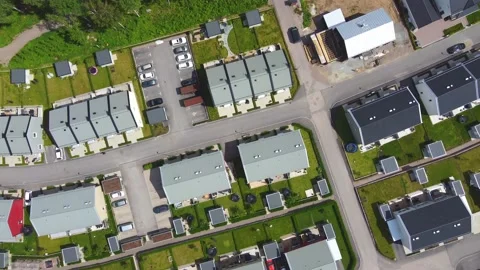 Top aerial drone view over modern scandinavian style houses with parking lots Stock Footage 238353588