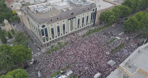 Top Aerial shot on Protesting people manifestation in Tbilisi around parliament Stock Footage 111272607