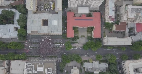 Top Aerial shot on Protesting people manifestation in Tbilisi around parliament Stock Footage 111273002
