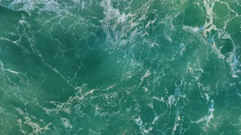 Top aerial slow motion view of surge ocean surface, beautiful foamy ocean waves Stock Footage 236615904