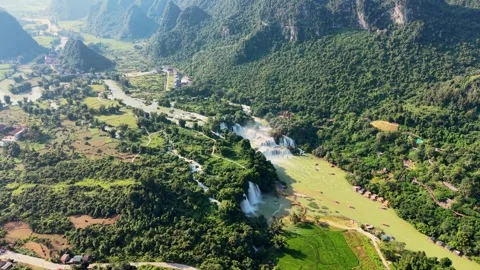 Top Aerial View of Ban Gioc Waterfall and Upstream River Stock Footage 345386926