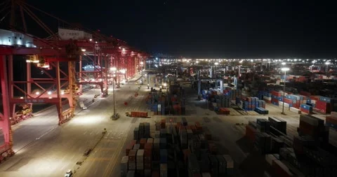 Top aerial view of cargo containers at night seaport. Fright delivery service. Stock Footage 319386058