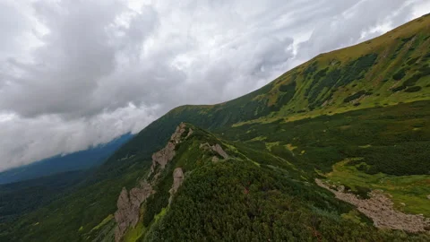 Top aerial view of drone view of green mountains. Beautiful landscape cloud sky Stock Footage 186117530