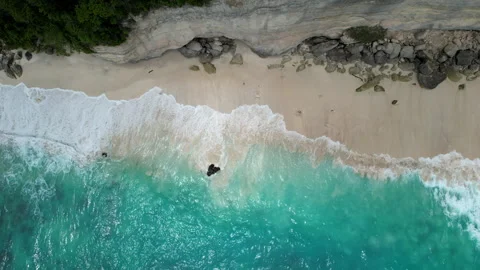 Top aerial view of empty Suwehan Beach with and without sun. Nusa Penida Isla Stock Footage 285088392