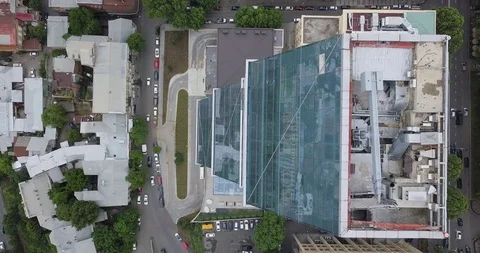 Top Aerial view looking down from above skyscrapers &amp; city buildings Stock Footage 108503119