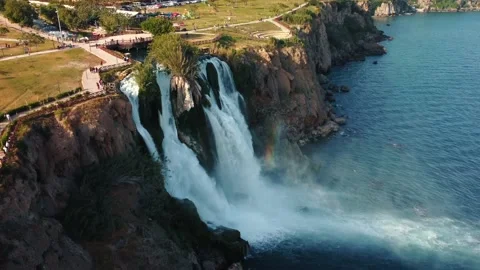 Top aerial view on a waterfall falling from a cliff Stock Footage 195243069