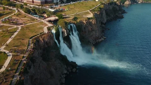 Top aerial view on a waterfall falling from a cliff Stock Footage 195243267