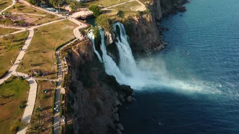 Top aerial view on a waterfall falling from a cliff Stock Footage 195243298