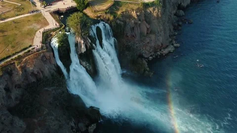 Top aerial view on a waterfall falling from a cliff Stock Footage 196740315