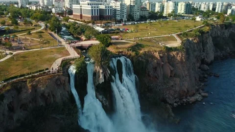 Top aerial view on a waterfall falling from a cliff Stock Footage 196740743